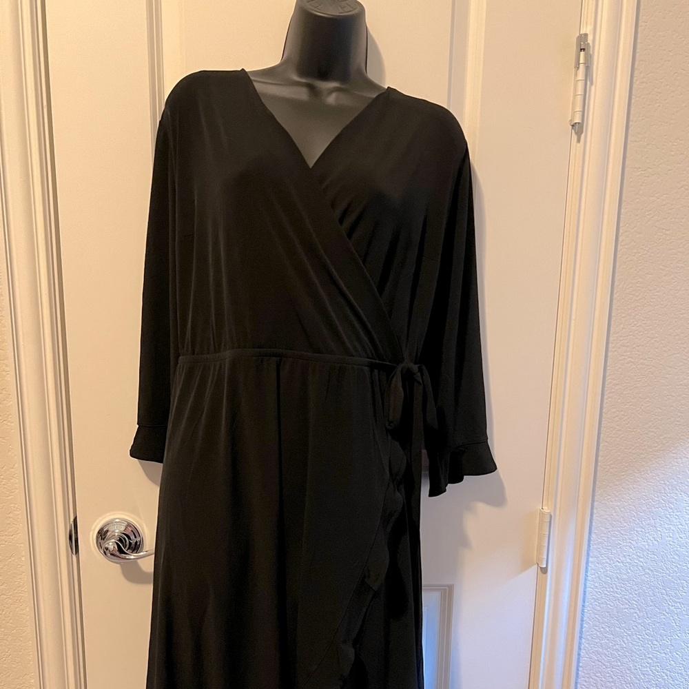 “Little black dress”, wrap around style with ruffle detail